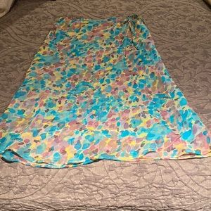 Ladies  Cato Watercolor pastel skirt.  Front layered wrap ties on the side.